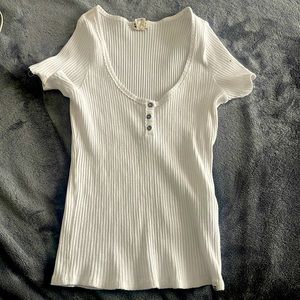 This is a tight white T-shirt